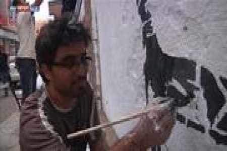 الفنان اليمني سبيع.. وفن الرسم على الجدران