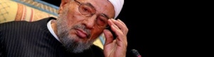 الإنتربول يصدر تعميما للقبض على القرضاوي